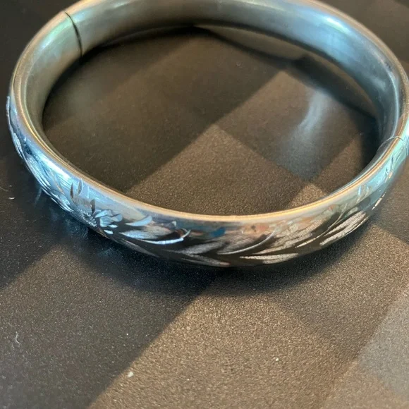 Classic Sterling Silver Polished Bangle Bracelet with Floral Design